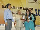 National award 2013 for best playback singer for the song khurkhura from the Marathi film tuhya dharma kuncha  